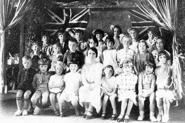 7/9: Group 139 children dressed for Western Australian Centenary Day 13 September 1929 with their first teacher Elsie Wilkinson (a settler's wife)